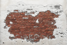 exposed bricks in an old wall 