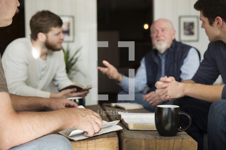 men in discussion at a Bible study.