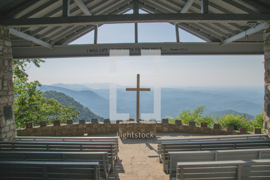 outdoor church with view of mountaintops 