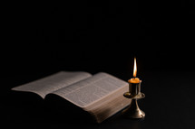 Bible and candlelight