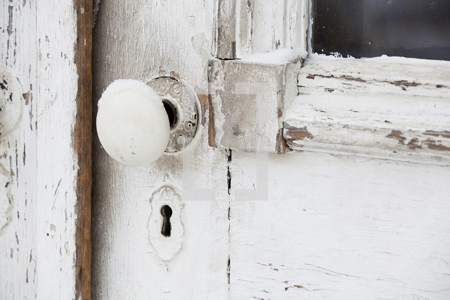 door knob on an old weathered door 