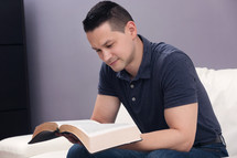 Man Reading Holy Bible