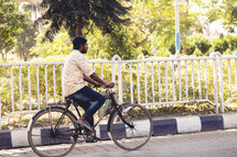 Man riding a bike in India