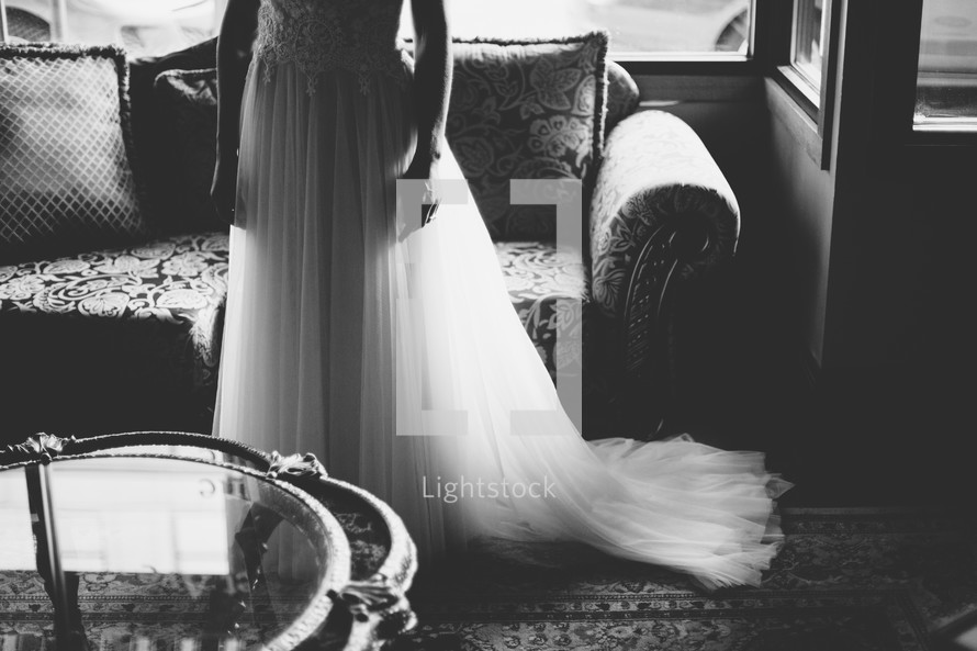 a bride standing in a room 