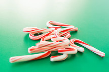 candy canes on green 