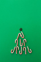 candy canes in the shape of a Christmas tree