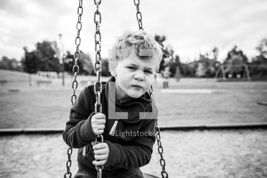 a child on a swing 