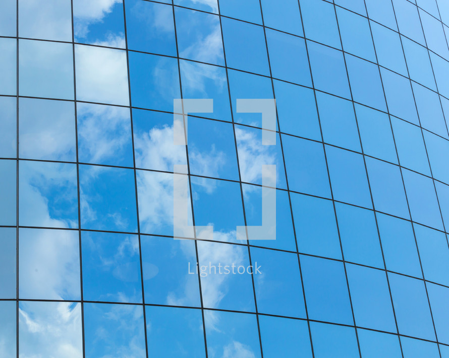 reflection of clouds in windows