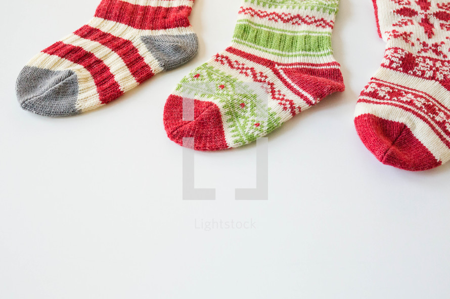 knit Christmas stockings on white 