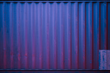 pink and purple corrugated metal background 