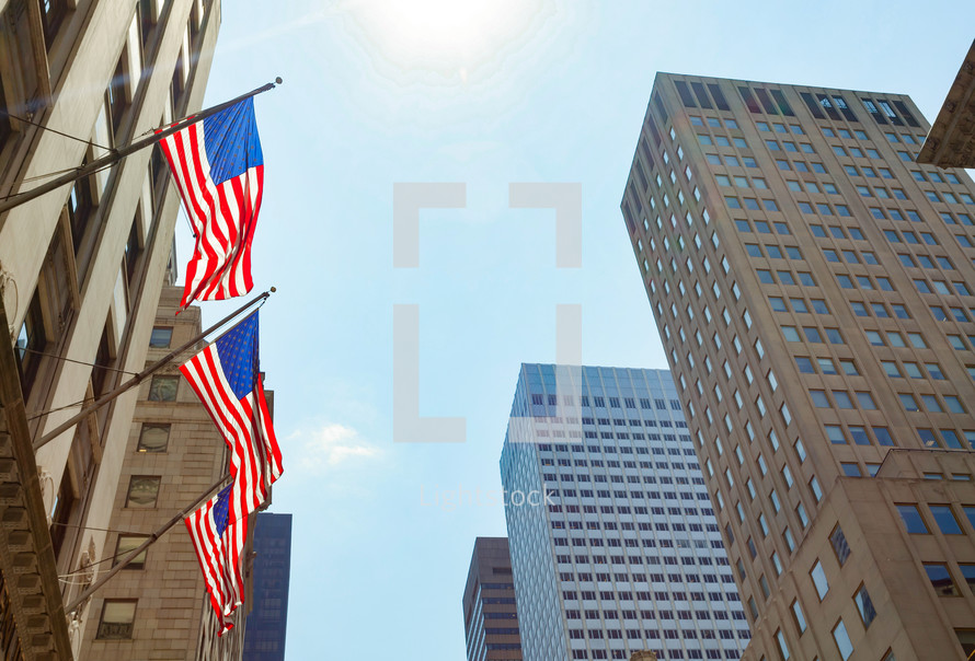 View of Fifth Avenue and American flags in New York City