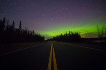 aurora above a highway 