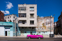 pink vintage car on the streets of Havana 