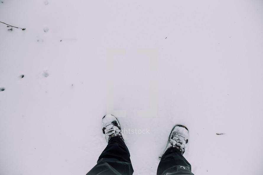 boots standing in snow 