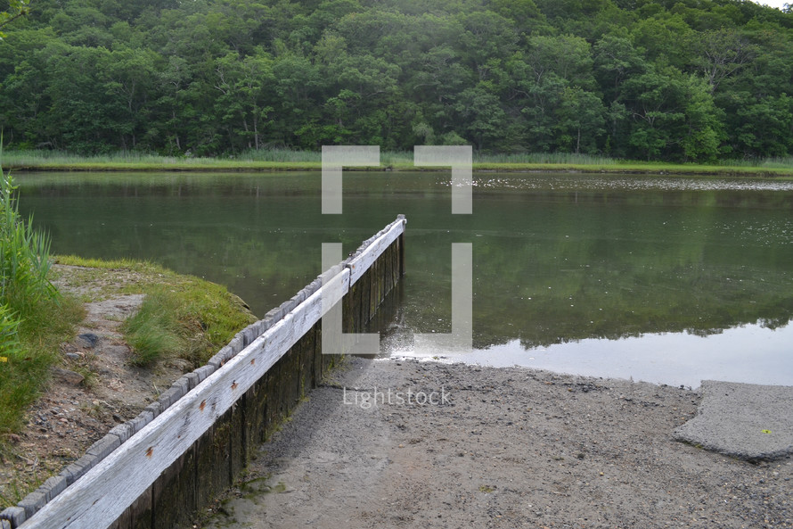 wooden fence in a pond 