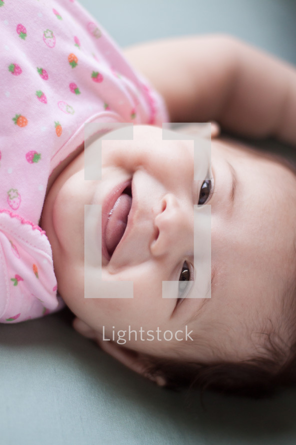 laughing infant girl 