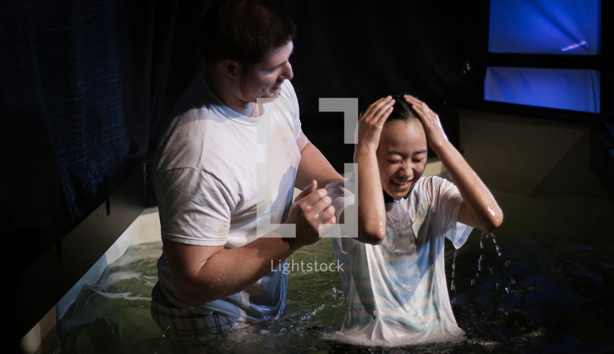child being baptized 
