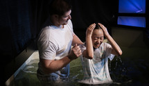 child being baptized 