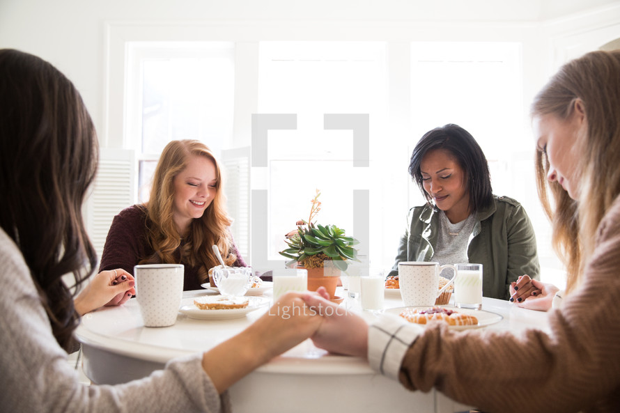 prayer and breakfast at a woman's group gathering 