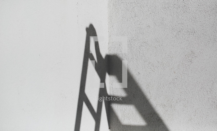ladder shadow on a wall 