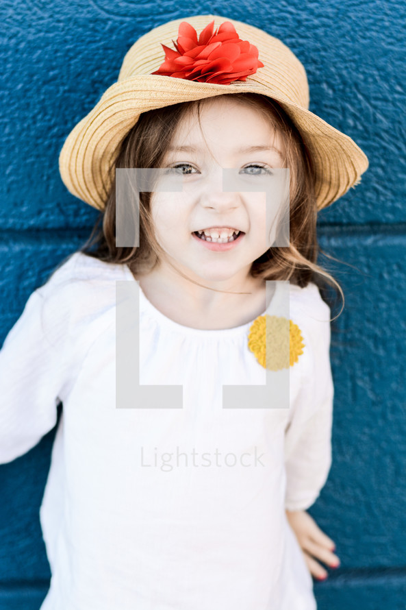 a little girl in a bonnet 