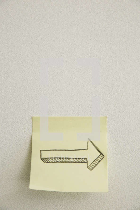 arrow on a post-it note 