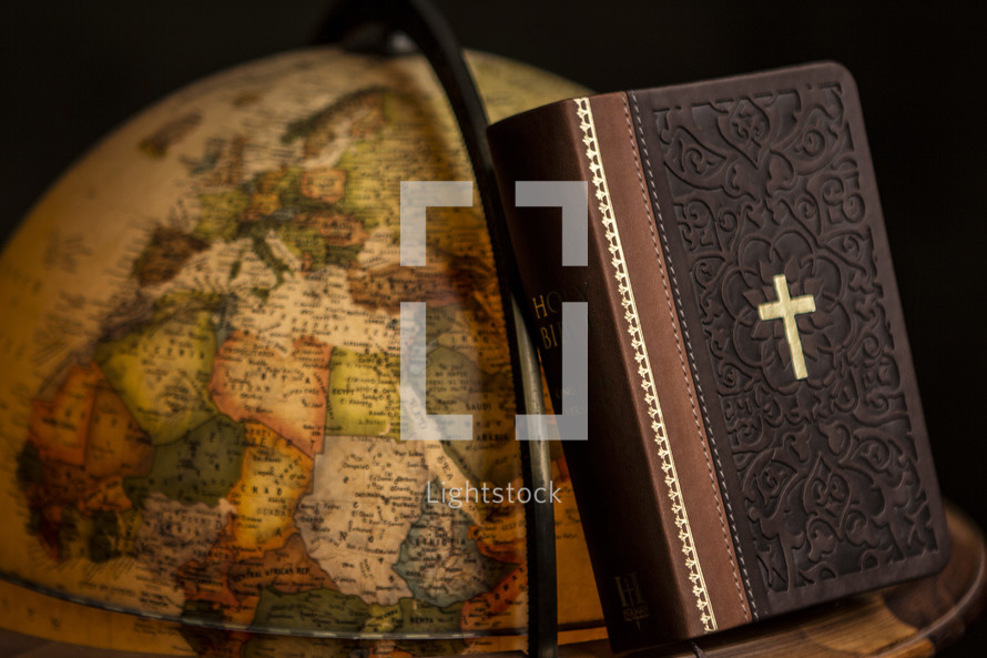 Bible and globe