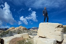 man standing on top of a rock in Nevada