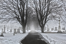 snow covered cemetery 