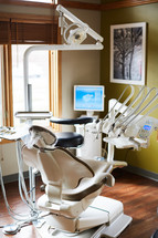 a chair in a dentist office 