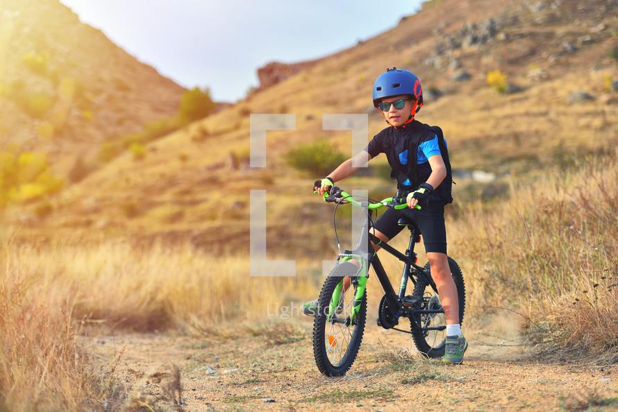 child on a bike on a trial 