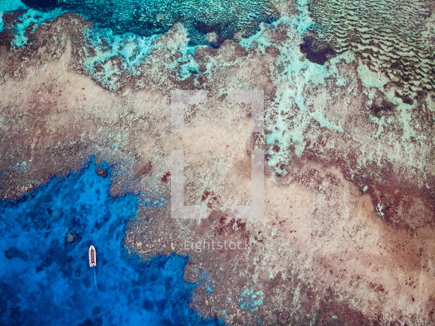boats and coral reef 