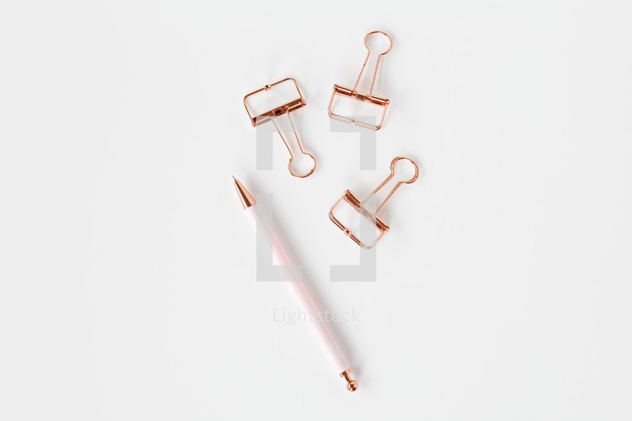 rose gold clips and pen 