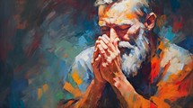 Older man praying