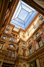 skylight Window and Colourful Facade at Galleria Sciarra in Rome, Italy