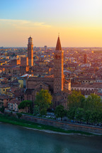 Verona, Italy at summer sunset, sun lens flare