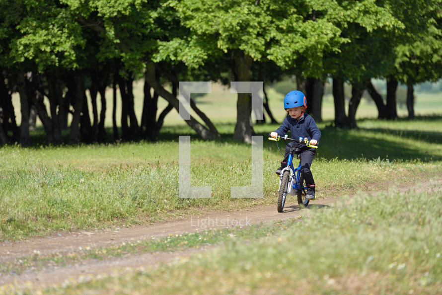 active child riding a bike 