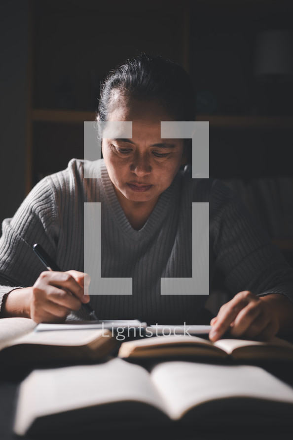 Woman studying a Bible