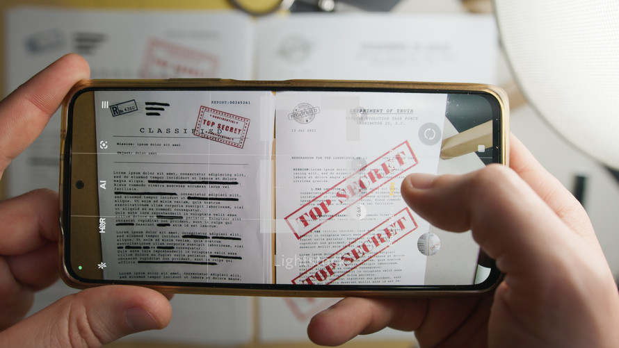 Photograph top secret files with smartphone