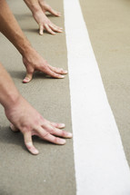 hands at the starting line