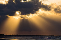Early morning sun through clouds, Ocean Isle Beach, North Carolina.