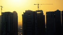 Silhouette of skyscrapers at sunrise 