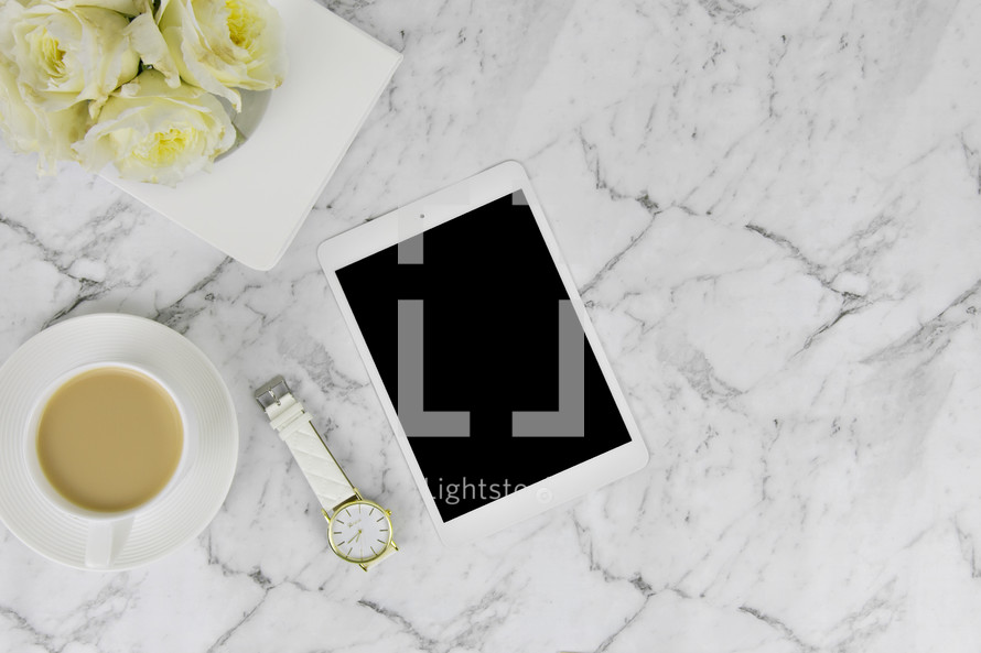 Carrara marble, iPad, pen,  paperclips, gold, white, coffee cup, roses, watch, journal, copy space 