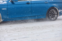 car driving through snow 