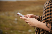 a woman texting 