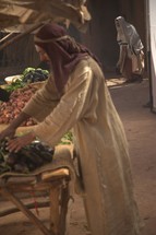 man selling vegetables in biblical times 