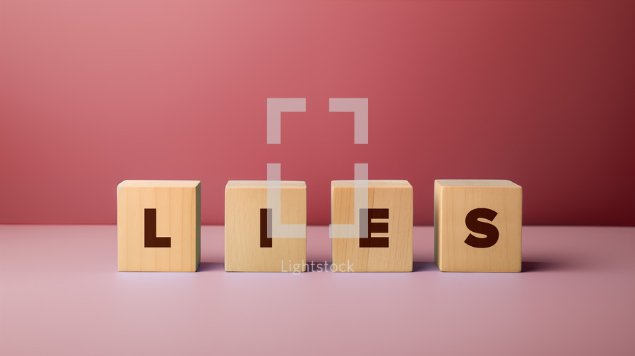 Wooden blocks with the word lies. 