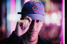 a man in a Cubs hat 