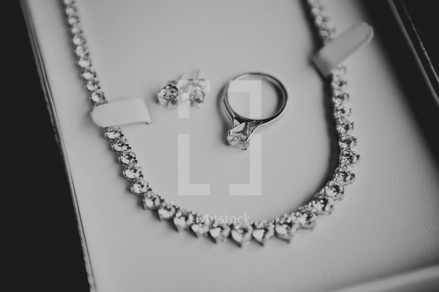 Diamond necklace, ring and earrings