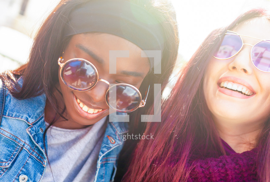 Friends smiling with sunglasses